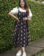 Gripping Black Rayon Ekat Print Dungaree Dress